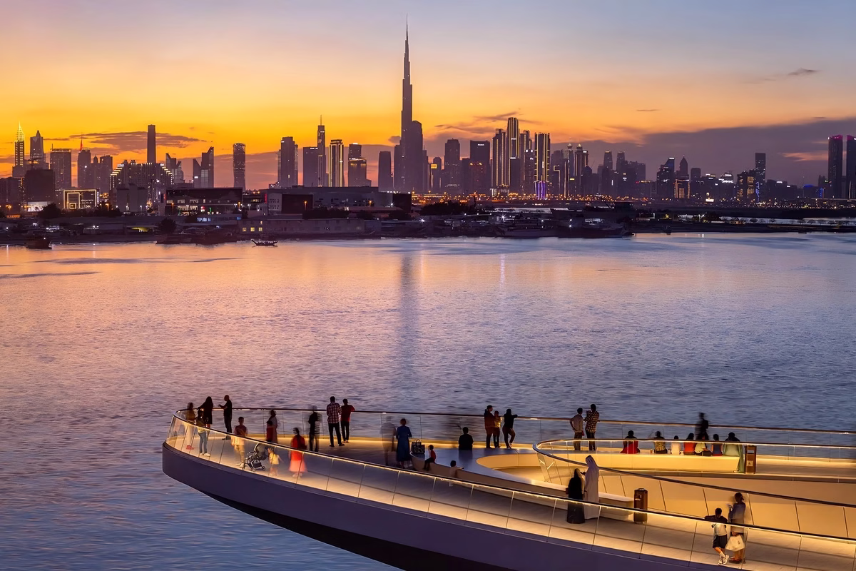 Luxurious waterfront lifestyle at Dubai Creek Harbour with modern architecture, leisure areas, and skyline views.
